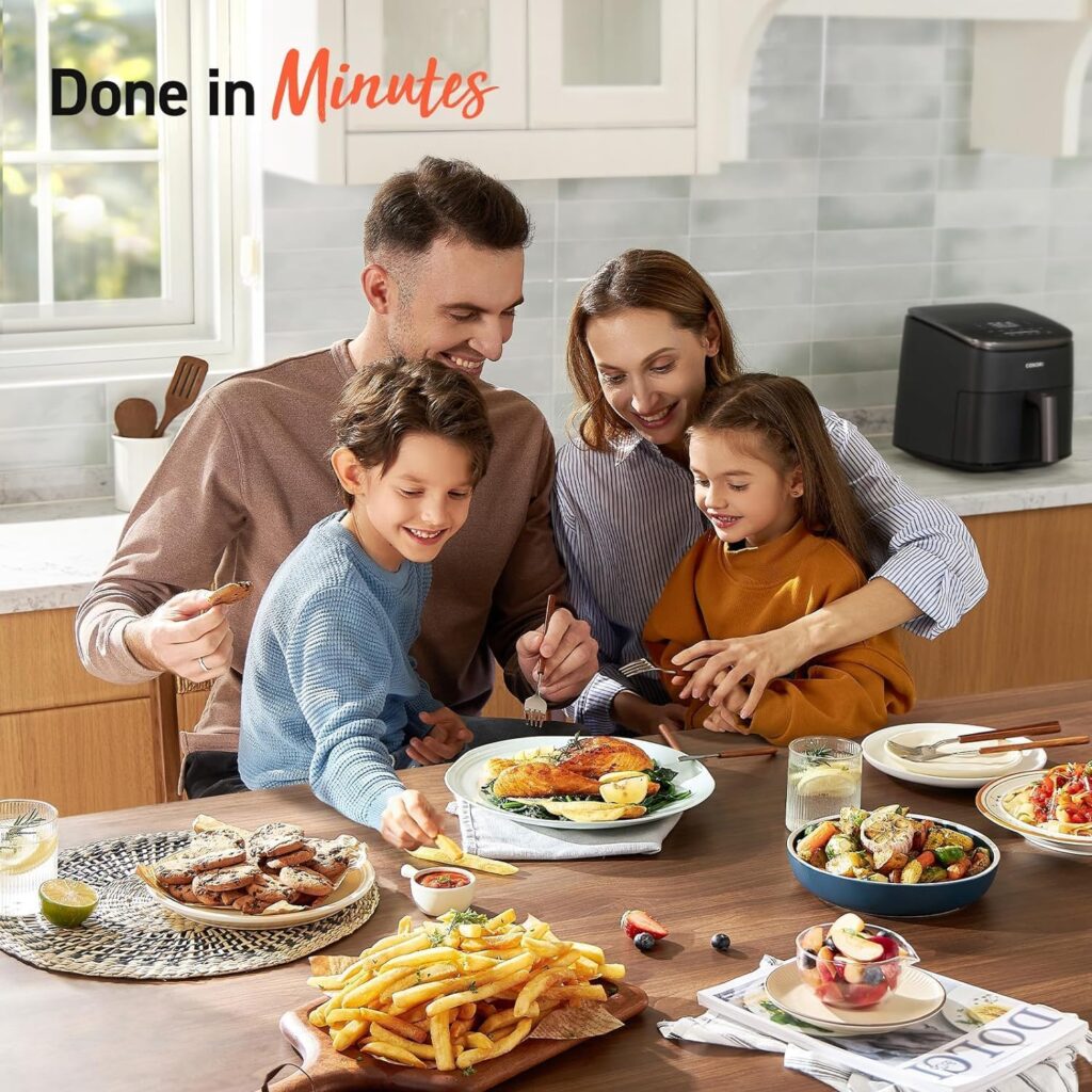 Family around a table laid with delicious looking food