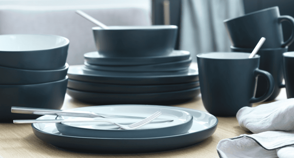 Blue and white stoneware dinner set display