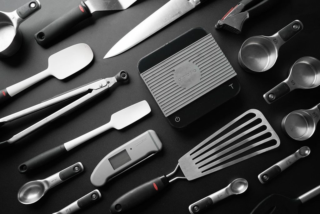 A selection of kitchen tools as a lead-in to the next section summarising types of kitchen tools