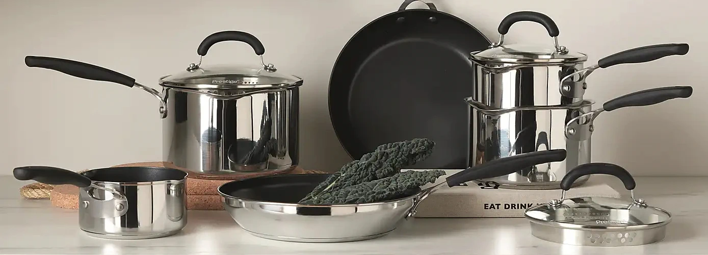 Cover image of a Prestige stainless steel cookware set on a kitchen top